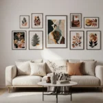 Stylish living room wall decor ideas featuring a curated gallery wall with botanical and abstract art frames arranged symmetrically above a modern beige sofa